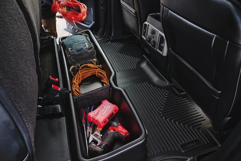 Husky under-seat storage with floor liners