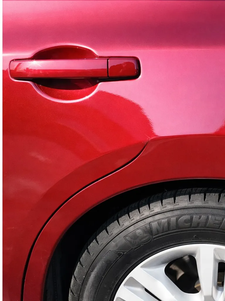 Dent after paintless dent repair
