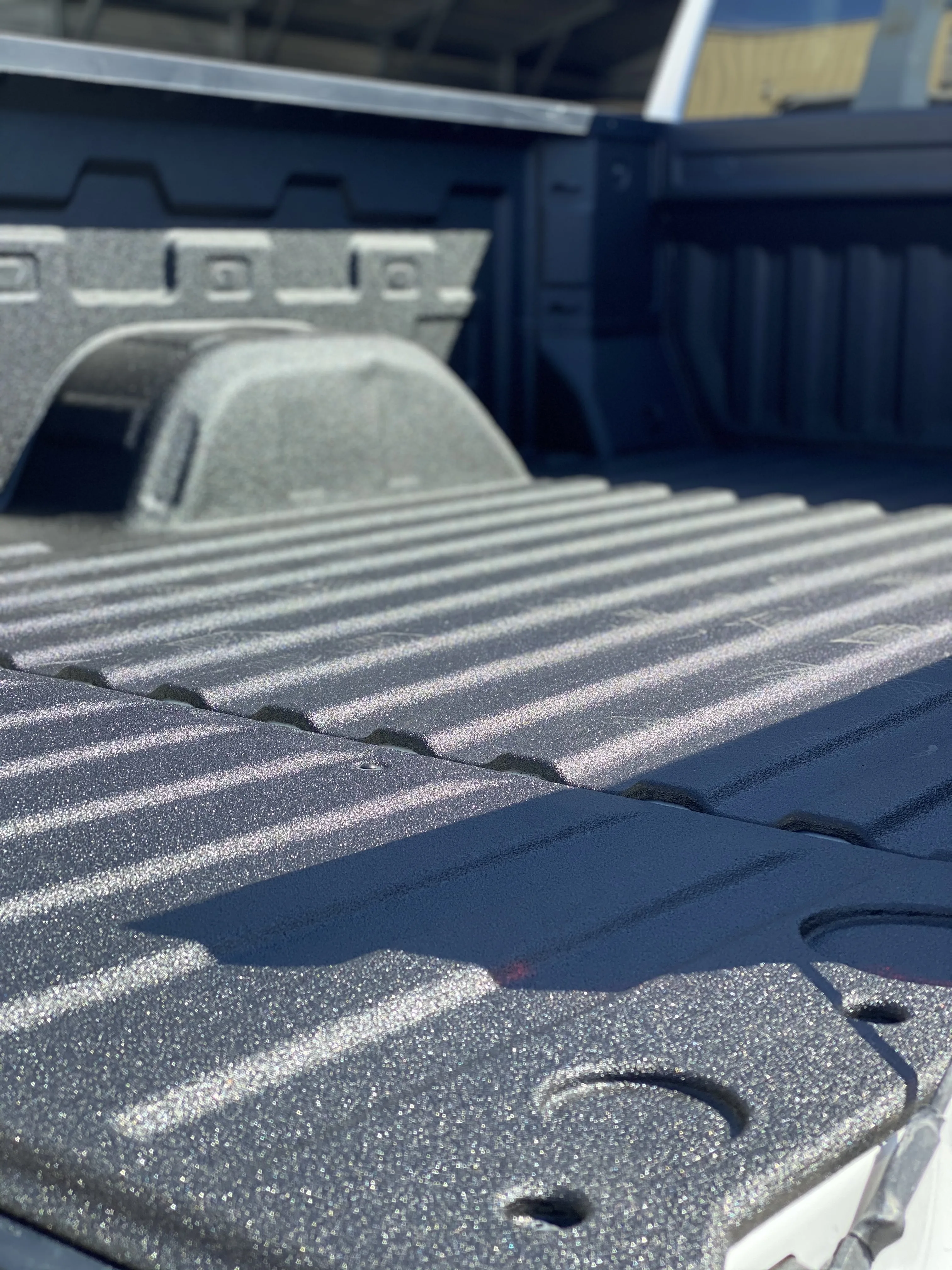 Spray-on truck bedliner close-up texture